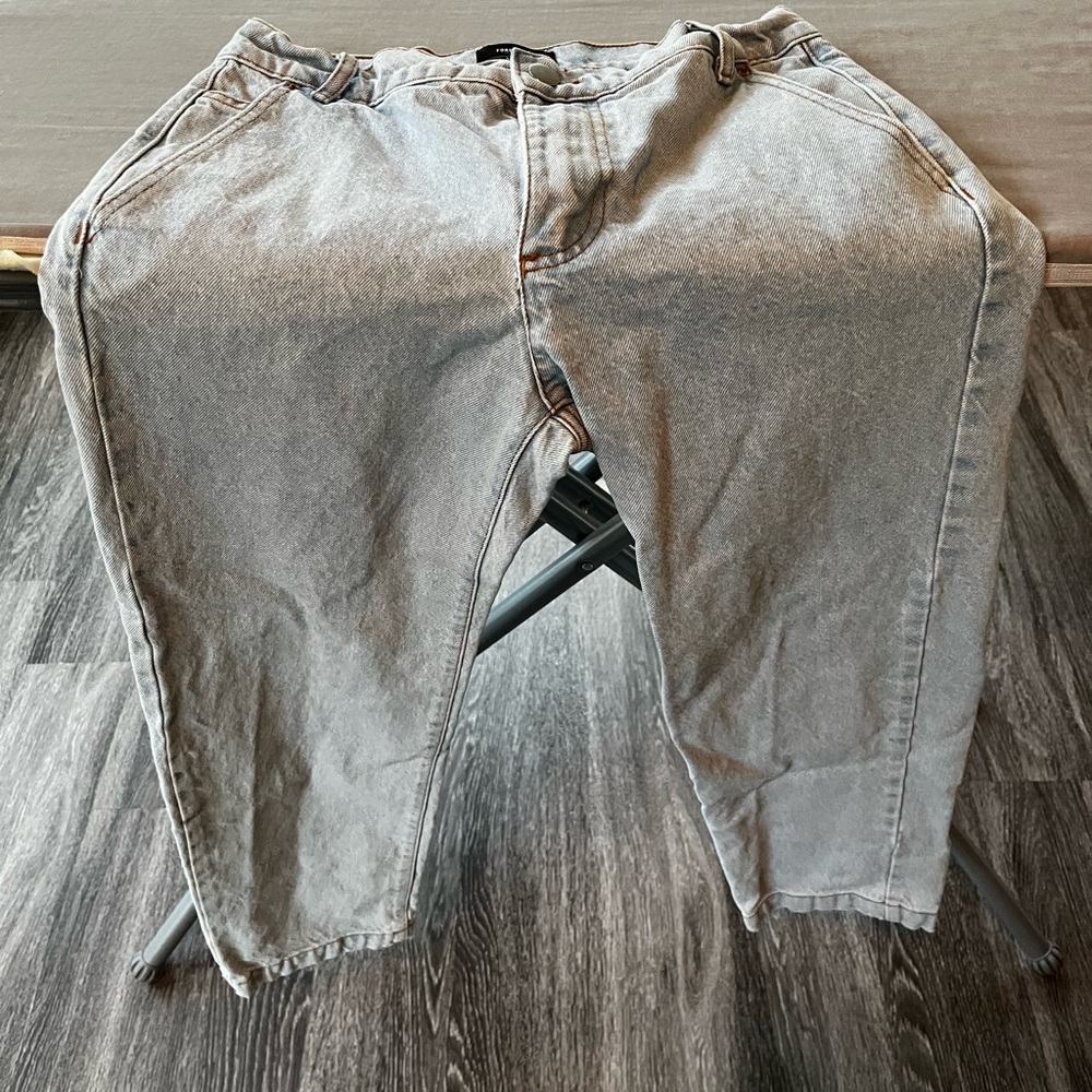 Size 29, light wash, wide leg, loose jeans
